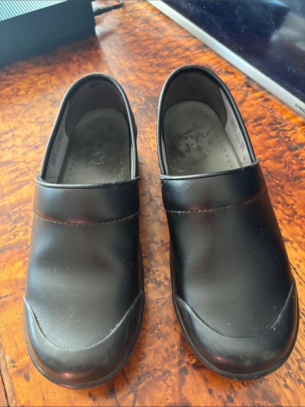 Dansko Black Smooth Leather Slip-On Clogs